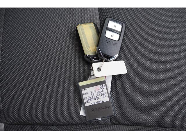 フィット ｅ：ＨＥＶクロスター　ホンダセンシング／衝突軽減ブレーキ／クルーズコントロール／ＬＥＤヘッドライト／１６インチアルミホイール／純正ナビ／ＥＴＣ／ＴＶ／バックカメラ／サイドカーテンエアバック／ＣＤ／ＤＶＤ／（53枚目）