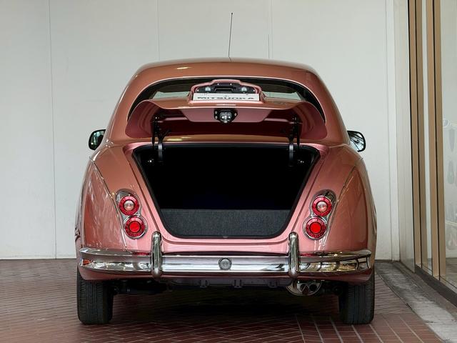 ビュート １２ＳＴ　メイクアップ車　クラシックインパネ　本革シート　キーレスエントリー電動格納ミラー　トランクダンパー（26枚目）