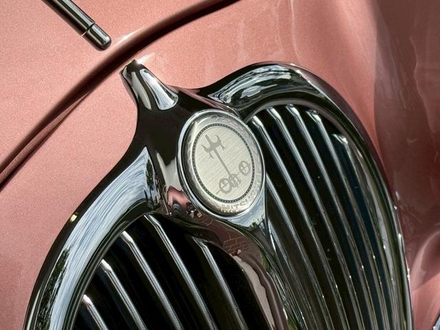 ビュート １２ＳＴ　メイクアップ車　クラシックインパネ　本革シート　キーレスエントリー電動格納ミラー　トランクダンパー（30枚目）