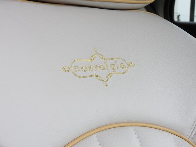 ビュート なでしこ　１２ＳＴノスタルジア　ワンオーナー　専用新色　特別仕様車　専用ボディカラー　専用カラードホイール　専用グリルバッヂ　専用リヤエンブレム　専用色クラシックインパネ　専用カラードドアトリム　専用刺繍入りレザーシート　メモリーナビ地デジ（21枚目）