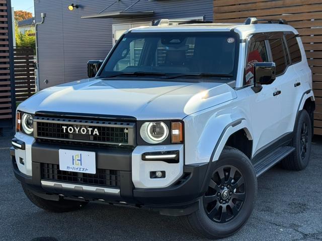 ランドクルーザー２５０ ＶＸファーストエディション　モデリスタシグネチャーイルミ　モデリスタオーバーフェンダー　サンルーフ　丸１眼ＬＥＤヘッド　全方位モニター　ルーフレール　純正１８インチＡＷ　ＥＴＣ２．０　ＢＳＭ　パワーシート　純正ナビ　ＴＶ　Ｂカメ（2枚目）