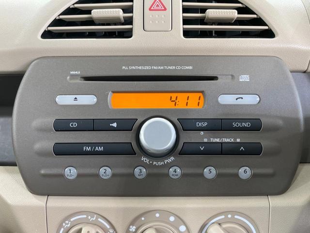 F 禁煙車 キーレスエントリー 運転席助手席エアバッグ パワーウィンドウ パワードアロック セキュリティーアラーム 14インチアルミホイール エアコン 純正オーディオ CDプレイヤー(3枚目)