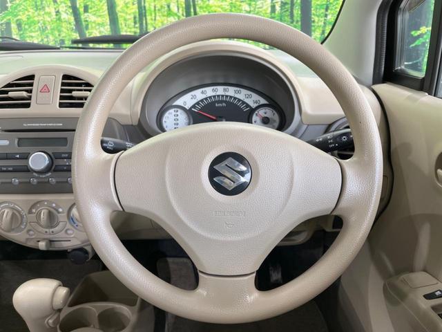 F 禁煙車 キーレスエントリー 運転席助手席エアバッグ パワーウィンドウ パワードアロック セキュリティーアラーム 14インチアルミホイール エアコン 純正オーディオ CDプレイヤー(12枚目)