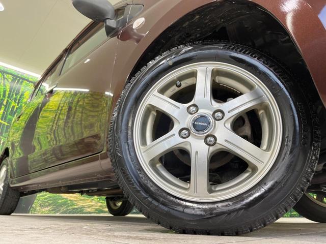 F 禁煙車 キーレスエントリー 運転席助手席エアバッグ パワーウィンドウ パワードアロック セキュリティーアラーム 14インチアルミホイール エアコン 純正オーディオ CDプレイヤー(14枚目)