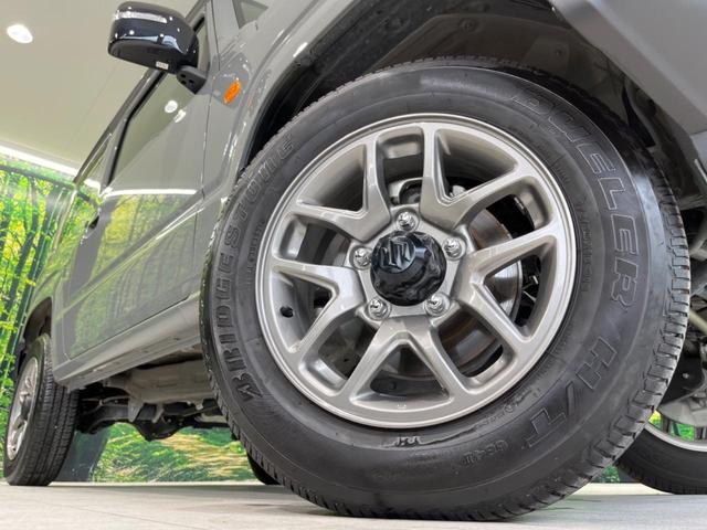 XC 4WD MT 禁煙車 クルーズコントロール LEDヘッドライト スマートキー オートライト オートエアコン 純正16インチアルミホイール 革巻きステアリング CD再生オーディオ 横滑防止装置(14枚目)
