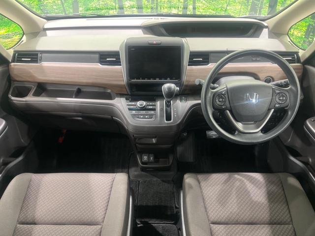 フリード G・ホンダセンシング 両側電動スライドドア 純正9型ナビ バックカメラ Bluetooth アダプティブクルーズコントロール ドラレコ ETC スマートキー&プッシュスタート オートライト 禁煙車 衝突被害軽減装置(2枚目)