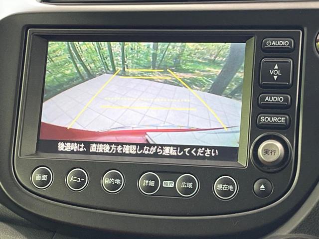 フィット ＲＳ　純正ナビ　バックカメラ　ＣＤ／ＤＶＤ再生　ドラレコ　ＥＴＣ　キーレスエントリー　オートエアコン　オートライト　ＨＩＤヘッドライト　純正１６インチＡＷ　禁煙車　電動格納ミラー　ドアバイザー（4枚目）