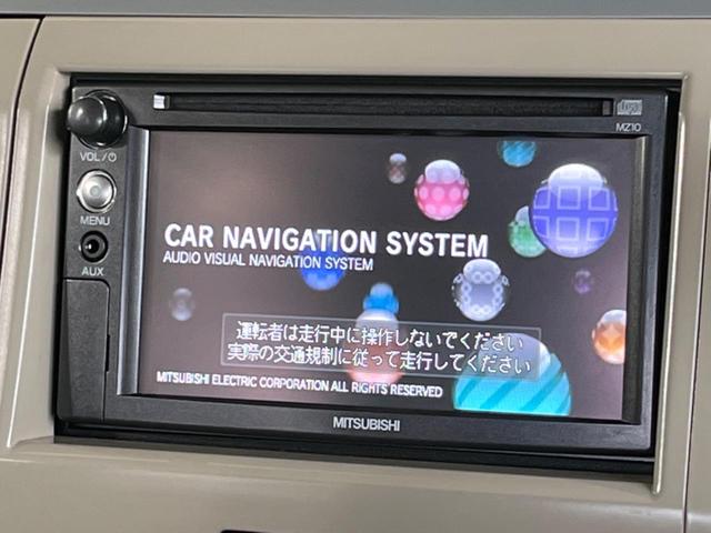アルトラパン Ｇ　ＳＤナビ　スマートキー＆プッシュスタート　シートリフター　ドアバイザー　禁煙車　運転席＆助手席エアバッグ　盗難防止システム　衝突安全ボディ　パワーステアリング　パワーウィンドウ　プライバシーガラス（3枚目）