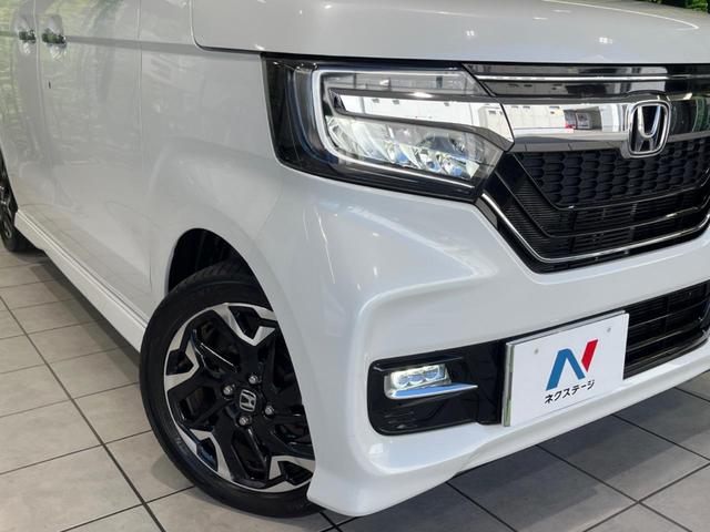 N-BOXカスタム G・Lターボホンダセンシング ターボ 両側電動ドア 純正8インチナビ アダプティブクルーズ ドラレコ ETC 衝突被害軽減システム 禁煙車 Bluetooth接続 オートハイビーム 車線逸脱警報 誤発進抑制機能 先行車発進お知らせ(12枚目)