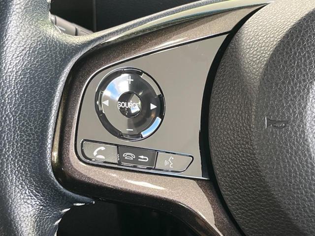 N-BOXカスタム G・Lターボホンダセンシング ターボ 両側電動ドア 純正8インチナビ アダプティブクルーズ ドラレコ ETC 衝突被害軽減システム 禁煙車 Bluetooth接続 オートハイビーム 車線逸脱警報 誤発進抑制機能 先行車発進お知らせ(31枚目)