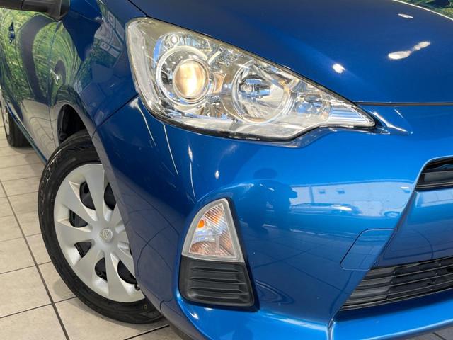 アクア G 純正ナビ バックカメラ ETC スマートキー&プッシュスタート オートエアコン オートライト 禁煙車 電動格納ミラー ドアバイザー 横滑り防止システム 運転席&助手席エアバッグ 衝突安全ボディ(12枚目)