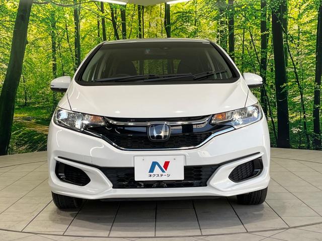 フィットハイブリッド F SDナビ 衝突軽減装置 アダプティブクルーズコントロール 禁煙車 誤発進抑制機能 ETC オートエアコン プッシュスタート&スマートキー 純正15インチスチールホイール 電動格納ドアミラー(14枚目)