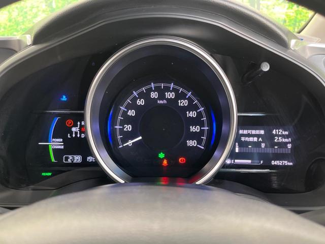 フィットハイブリッド F SDナビ 衝突軽減装置 アダプティブクルーズコントロール 禁煙車 誤発進抑制機能 ETC オートエアコン プッシュスタート&スマートキー 純正15インチスチールホイール 電動格納ドアミラー(45枚目)