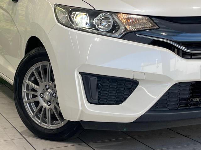 フィット １３Ｇ・Ｌパッケージ　純正８型ナビ　バックカメラ　禁煙車　スマートキー　ＬＥＤヘッド　ＥＴＣ　オートライト　オートエアコン　Ｂｌｕｅｔｏｏｔｈ再生　ＣＤ／ＤＶＤ再生　フルセグ　アイドリングストップ　横滑り防止（11枚目）