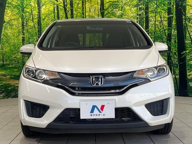 フィット １３Ｇ・Ｌパッケージ　純正８型ナビ　バックカメラ　禁煙車　スマートキー　ＬＥＤヘッド　ＥＴＣ　オートライト　オートエアコン　Ｂｌｕｅｔｏｏｔｈ再生　ＣＤ／ＤＶＤ再生　フルセグ　アイドリングストップ　横滑り防止（13枚目）