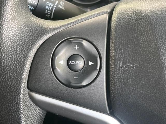 フィット １３Ｇ・Ｌパッケージ　純正８型ナビ　バックカメラ　禁煙車　スマートキー　ＬＥＤヘッド　ＥＴＣ　オートライト　オートエアコン　Ｂｌｕｅｔｏｏｔｈ再生　ＣＤ／ＤＶＤ再生　フルセグ　アイドリングストップ　横滑り防止（22枚目）