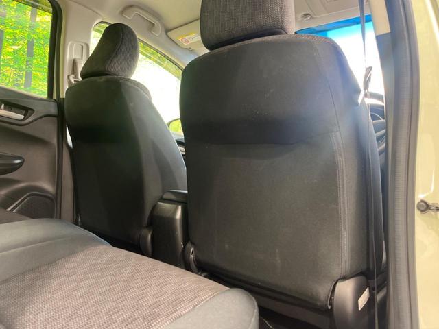 フィット １３Ｇ・Ｌパッケージ　純正８型ナビ　バックカメラ　禁煙車　スマートキー　ＬＥＤヘッド　ＥＴＣ　オートライト　オートエアコン　Ｂｌｕｅｔｏｏｔｈ再生　ＣＤ／ＤＶＤ再生　フルセグ　アイドリングストップ　横滑り防止（35枚目）