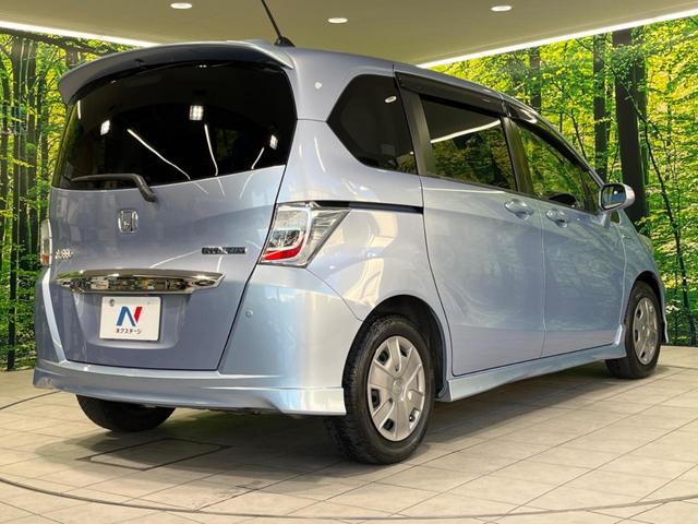 フリードハイブリッド ジャストセレクション　両側電動スライドドア　純正ナビ　バックカメラ　クルーズコントロール　ドラレコ　ＥＴＣ　スマートキー　オートエアコン　オートライト　ＨＩＤヘッドライト　ドアバイザー　電動格納ミラー　禁煙車（17枚目）