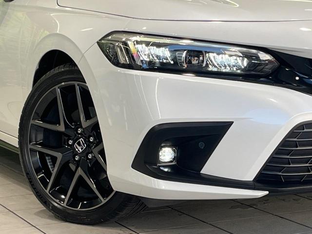 シビック ｅ：ＨＥＶ　メーカー９型ナビ　ＢＯＳＥサウンドシステム　衝突被害軽減システム　アダプティブクルーズ　禁煙車　ドラレコ　ＥＴＣ　Ｂｌｕｅｔｏｏｔｈ　バックカメラ　コーナーセンサー　ＬＥＤヘッド　純正１８インチＡＷ（12枚目）