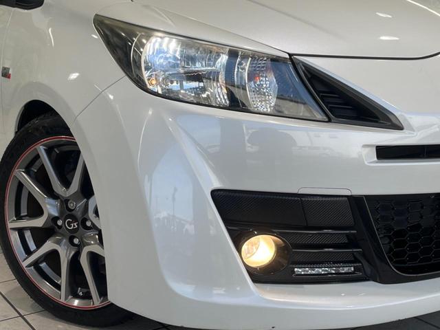 ヴィッツ RS G’s 純正ナビ ドラレコ ETC 純正17インチアルミレッドライン入 大型マフラー LEDイルミネーションビーム HIDヘッド アルミ製ペダル 革巻きステアリング バックカメラ ドアバイザー 電動格納ミラー(12枚目)