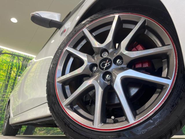 ヴィッツ RS G’s 純正ナビ ドラレコ ETC 純正17インチアルミレッドライン入 大型マフラー LEDイルミネーションビーム HIDヘッド アルミ製ペダル 革巻きステアリング バックカメラ ドアバイザー 電動格納ミラー(13枚目)
