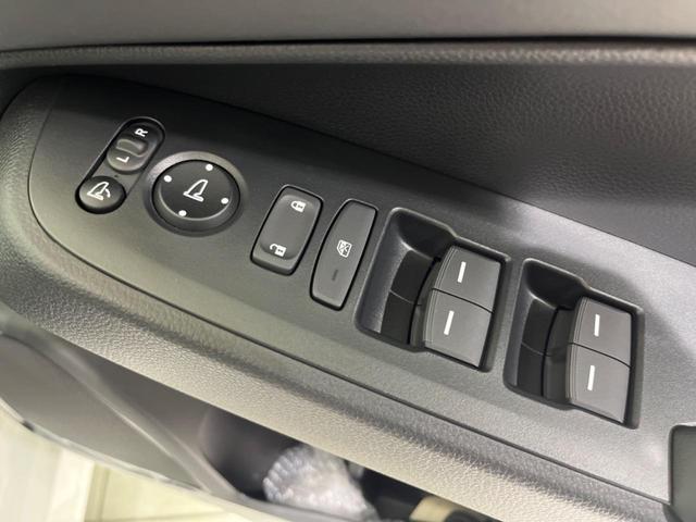 ヴェゼル ｅ：ＨＥＶ　Ｚ　純正９型ナビ　全周囲カメラ　ホンダセンシング　禁煙車　コーナーセンサー　スマートキー　ＬＥＤヘッド　ＥＴＣ　純正１８インチアルミ　パワーバックドア　車線逸脱警報　オートライト　デュアルエアコン（30枚目）