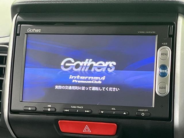 Ｎ－ＢＯＸ Ｇ・ターボＬパッケージ　純正ナビ　両側電動スライドドア　衝突被害軽減システム　禁煙車　バックカメラ　スマートキー　クルーズコントロール　純正１４インチアルミ　オートエアコン　アイドリングストップ　純正革巻きステアリング（3枚目）