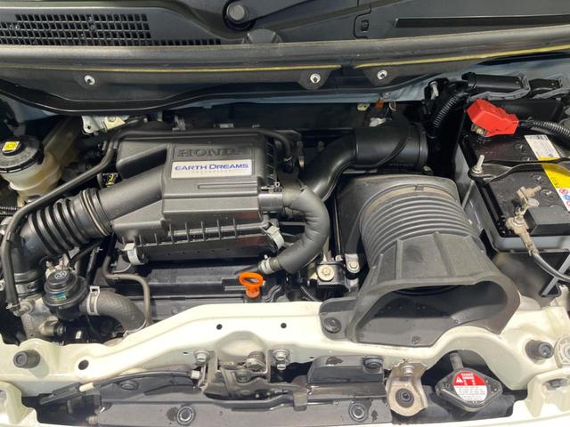 Ｎ－ＢＯＸ Ｇ・ターボＬパッケージ　純正ナビ　両側電動スライドドア　衝突被害軽減システム　禁煙車　バックカメラ　スマートキー　クルーズコントロール　純正１４インチアルミ　オートエアコン　アイドリングストップ　純正革巻きステアリング（18枚目）