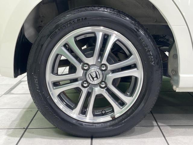 Ｎ－ＢＯＸ Ｇ・ターボＬパッケージ　純正ナビ　両側電動スライドドア　衝突被害軽減システム　禁煙車　バックカメラ　スマートキー　クルーズコントロール　純正１４インチアルミ　オートエアコン　アイドリングストップ　純正革巻きステアリング（25枚目）