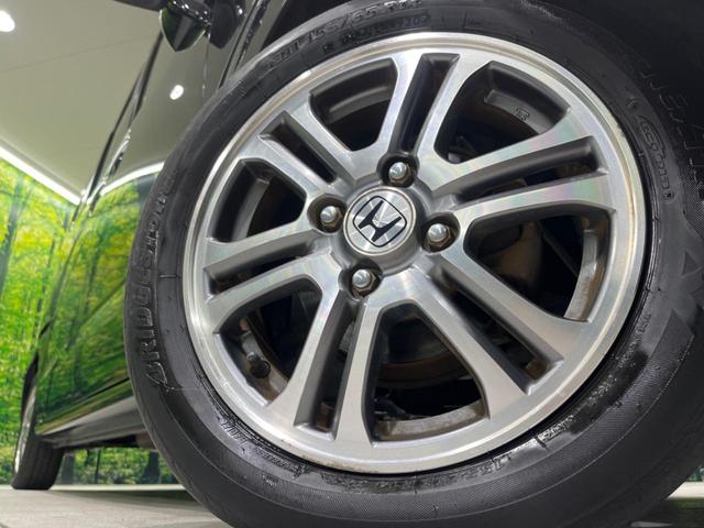 Ｎ－ＢＯＸ Ｇ　ＳＳパッケージ　両側電動スライドドア　ＳＤナビ　バックカメラ　スマートキー＆プッシュスタート　オートエアコン　アイドリングストップ　純正１４インチＡＷ　禁煙車　横滑り防止システム　電動格納ミラー　盗難防止システム（13枚目）