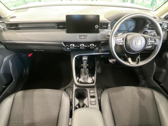 ヴェゼル e:HEV Z 寒冷地仕様 純正9型ナビ パワーバックドア アダプティブクルーズ シートヒーター ステアリングヒーター レーンキープ ETC オートマチックハイビーム ブラインドスポットモニター 禁煙車 衝突軽減装置(2枚目)