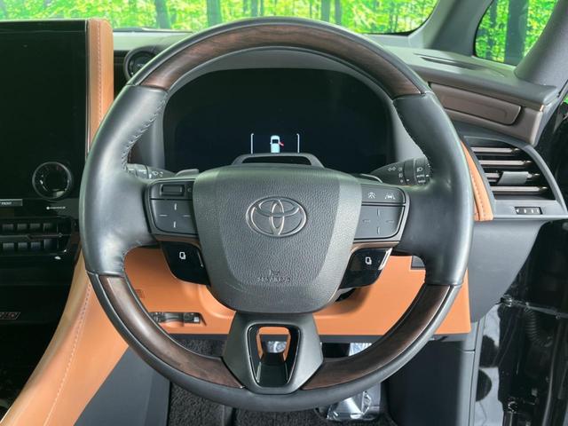 ヴェルファイアハイブリッド Ｚ　プレミア　純正１４型ナビ　後席モニター　左右独立ムーンルーフ　衝突軽減装置　茶革シート　両側電動ドア　全周囲カメラ　レーダークルーズ　電動リヤゲート　ＢＳＭ　デジタルインナーミラー　ＥＴＣ　禁煙車（12枚目）