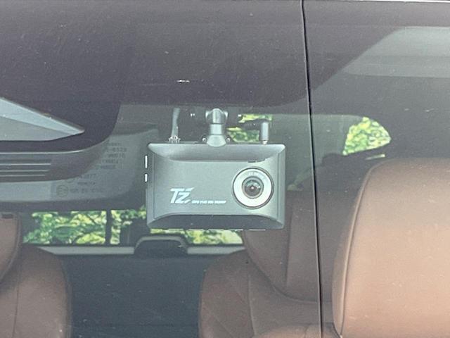 ヴェルファイアハイブリッド Ｚ　プレミア　純正１４型ナビ　後席モニター　左右独立ムーンルーフ　衝突軽減装置　茶革シート　両側電動ドア　全周囲カメラ　レーダークルーズ　電動リヤゲート　ＢＳＭ　デジタルインナーミラー　ＥＴＣ　禁煙車（23枚目）