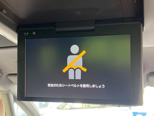 ヴェルファイアハイブリッド Ｚ　プレミア　純正１４型ナビ　後席モニター　左右独立ムーンルーフ　衝突軽減装置　茶革シート　両側電動ドア　全周囲カメラ　レーダークルーズ　電動リヤゲート　ＢＳＭ　デジタルインナーミラー　ＥＴＣ　禁煙車（25枚目）