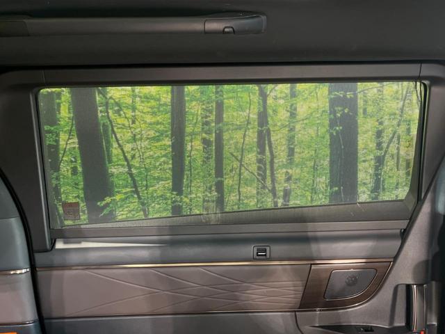 ヴェルファイアハイブリッド Ｚ　プレミア　純正１４型ナビ　後席モニター　左右独立ムーンルーフ　衝突軽減装置　茶革シート　両側電動ドア　全周囲カメラ　レーダークルーズ　電動リヤゲート　ＢＳＭ　デジタルインナーミラー　ＥＴＣ　禁煙車（58枚目）