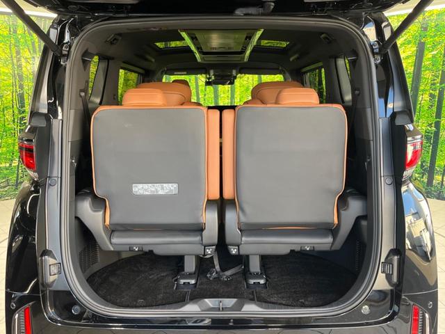 ヴェルファイアハイブリッド Ｚ　プレミア　純正１４型ナビ　後席モニター　左右独立ムーンルーフ　衝突軽減装置　茶革シート　両側電動ドア　全周囲カメラ　レーダークルーズ　電動リヤゲート　ＢＳＭ　デジタルインナーミラー　ＥＴＣ　禁煙車（63枚目）