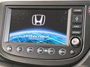 フィット ＲＳ　純正ナビ　バックカメラ　ＣＤ／ＤＶＤ再生　ドラレコ　ＥＴＣ　キーレスエントリー　オートエアコン　オートライト　ＨＩＤヘッドライト　純正１６インチＡＷ　禁煙車　電動格納ミラー　ドアバイザー（3枚目）