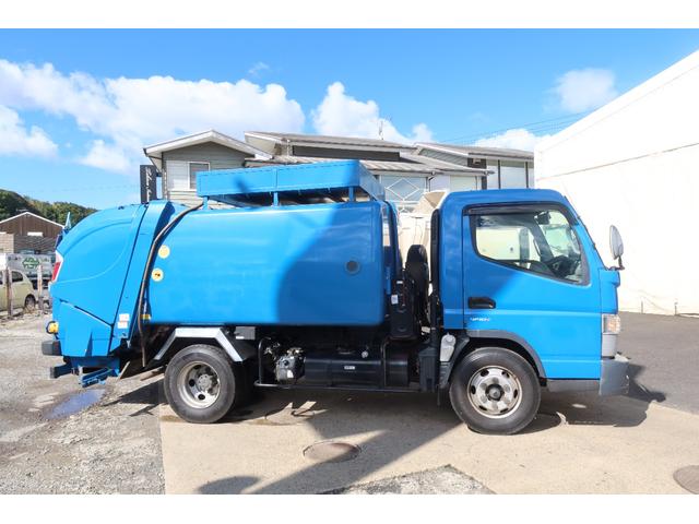 キャンター 　ワイド　極東　巻込みパッカー車　６．２立米　積載３１００ｋｇ　連続スイッチ付　汚水タンク付（4枚目）