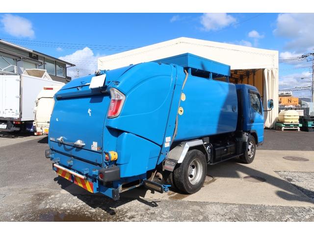 キャンター 　ワイド　極東　巻込みパッカー車　６．２立米　積載３１００ｋｇ　連続スイッチ付　汚水タンク付（5枚目）