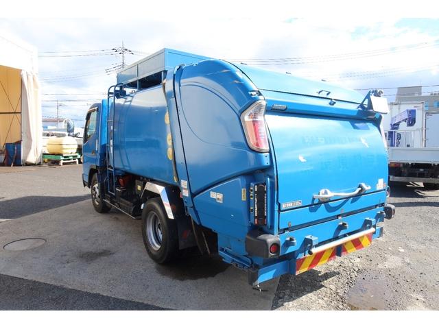 キャンター 　ワイド　極東　巻込みパッカー車　６．２立米　積載３１００ｋｇ　連続スイッチ付　汚水タンク付（7枚目）