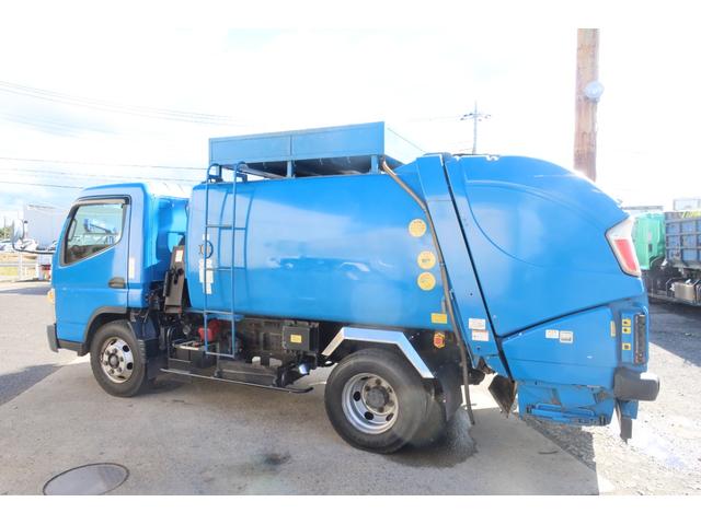 キャンター 　ワイド　極東　巻込みパッカー車　６．２立米　積載３１００ｋｇ　連続スイッチ付　汚水タンク付（8枚目）