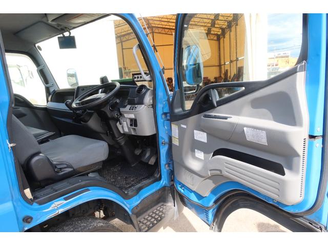 キャンター 　ワイド　極東　巻込みパッカー車　６．２立米　積載３１００ｋｇ　連続スイッチ付　汚水タンク付（64枚目）