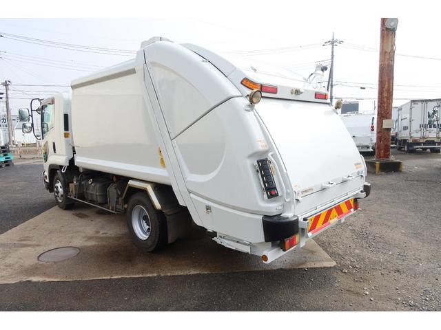 フォワード 　新明和　プレスパッカー車　８．２立米　汚水タンク付　連続スイッチ付　積載１７５０ｋｇ（5枚目）