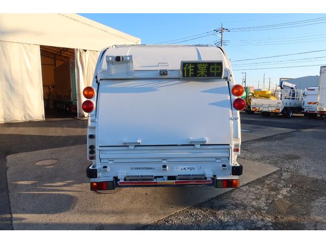 エルフトラック 　極東　プレスパッカー車　４．２立米　汚水タンク付　積載２０００ｋｇ　左スライドドア（6枚目）