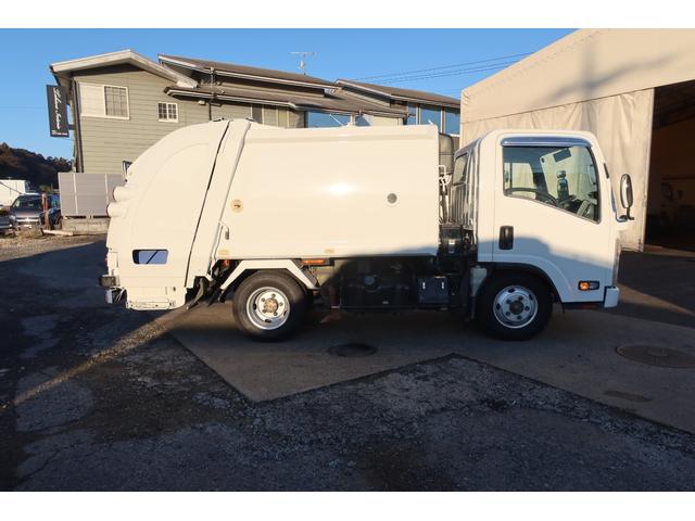 エルフトラック 　極東　プレスパッカー車　４．２立米　汚水タンク付　積載２０００ｋｇ　左スライドドア（8枚目）