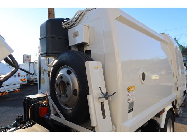 エルフトラック 　極東　プレスパッカー車　４．２立米　汚水タンク付　積載２０００ｋｇ　左スライドドア（50枚目）