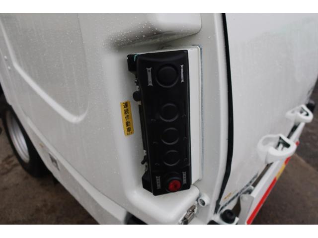 デュトロ 　新明和　巻込みパッカー車　５．１立米　汚水タンク付　連続スイッチ付　積載２０００ｋｇ（11枚目）