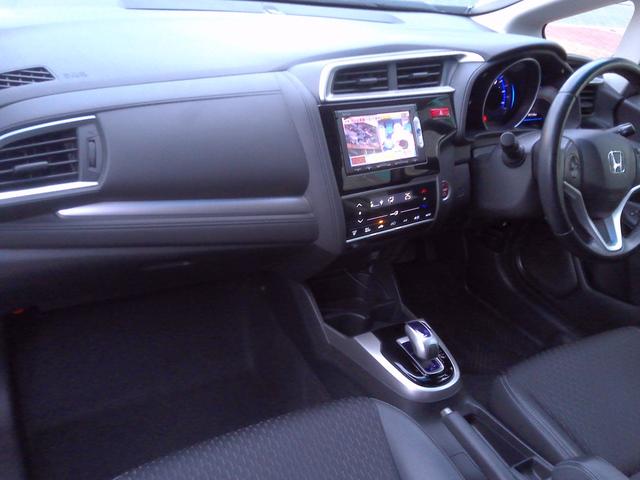 フィットハイブリッド Ｌパッケージ　電動格納式ミラー　ナビ＆ＴＶ　安全ボディ　ＬＥＤ　バックカメラ　オートクルーズコントロール　イモビライザー　１セグＴＶ　ＥＴＣ　ＡＵＴＯエアコン　ＡＢＳ　運転席助手席エアバッグ　運転席エアバック（34枚目）