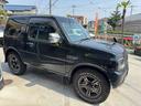 ジムニー ランドベンチャー　特別仕様車　４ＷＤ　ＭＴ　ハーフレザー　シートヒーター　ドラレコ前後　ヘッドライト．ＬＥＤテール．マフラー．マッドホワイトレター．エアインテーク．リアスポイラー．ナルディステアリング．ウッドシフトノブ（6枚目）