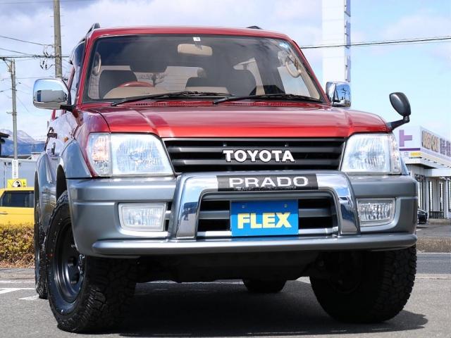 ＲＸ　ＭＴ車　純正カラーワインレッドＩＩ　茶系内装　新品ジムライン１６インチＡＷ　新品ジオランダー２６５タイヤ　新品ＴＯＹＯＴＡグリル　ルーフレール　メッキパーツ　バンパーガード　背面タイヤ(7枚目)